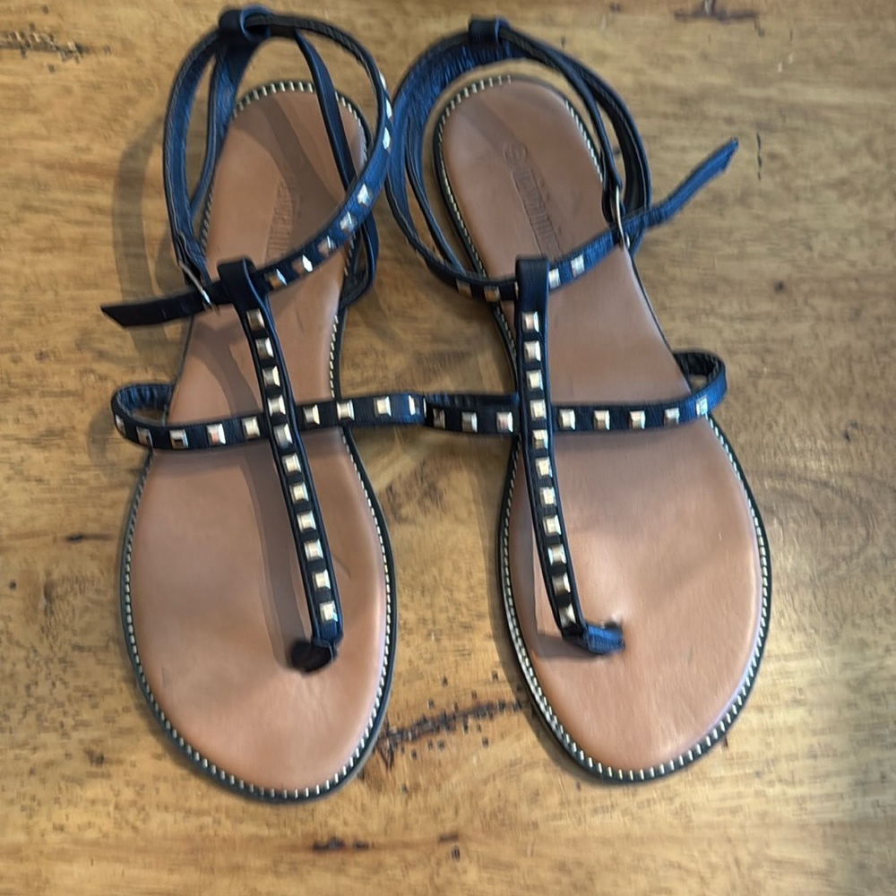 Like new wore only once black and gold sandals
